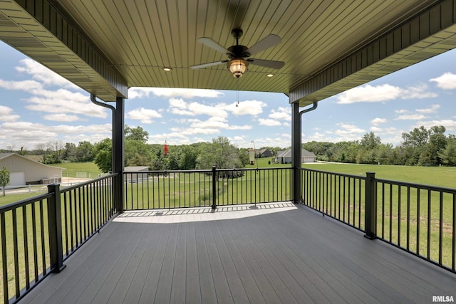 4811 Bitter Ct, Quincy, IL 62305 - wooden terrace featuring ceiling fan, a lawn, and view of scattered trees