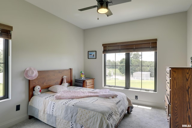 4811 Bitter Ct, Quincy, IL 62305 - carpeted bedroom featuring baseboards and a ceiling fan
