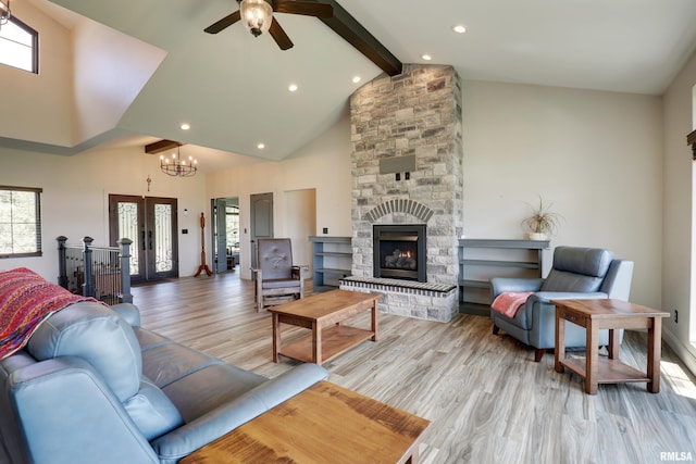 4811 Bitter Ct, Quincy, IL 62305 - living area featuring beam ceiling, healthy amount of natural light, high vaulted ceiling, a ceiling fan, and light wood-type flooring
