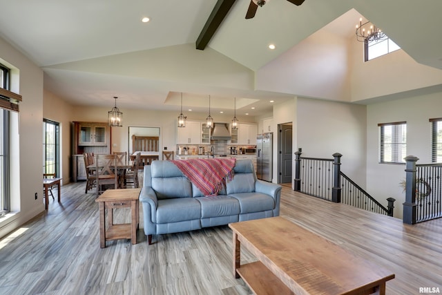 4811 Bitter Ct, Quincy, IL 62305 - living area with a chandelier, high vaulted ceiling, healthy amount of natural light, light wood-style flooring, and beamed ceiling