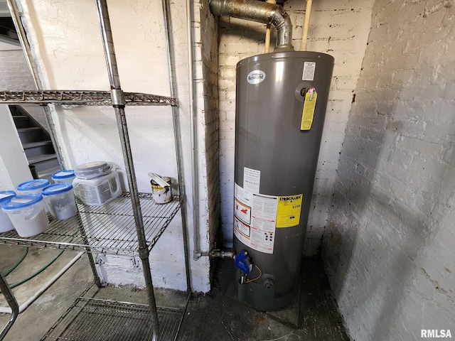 228 4th St, Lincoln, IL 62656 - utility room with gas water heater