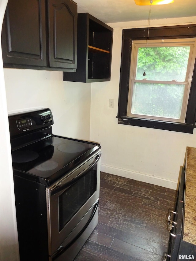 2536 S 10th St, Springfield, IL 62703 - kitchen with electric stove and baseboards