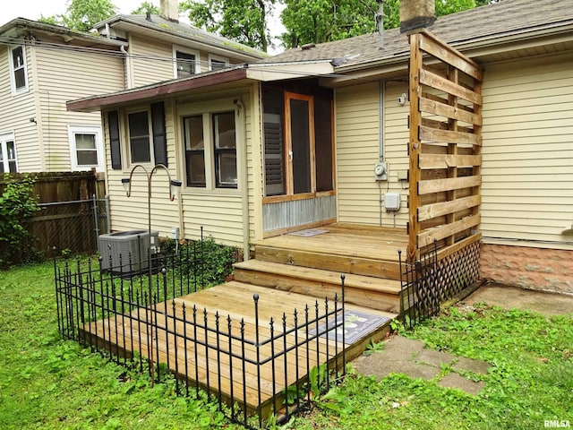 2536 S 10th St, Springfield, IL 62703 - rear view of house with a chimney, roof with shingles, and central AC