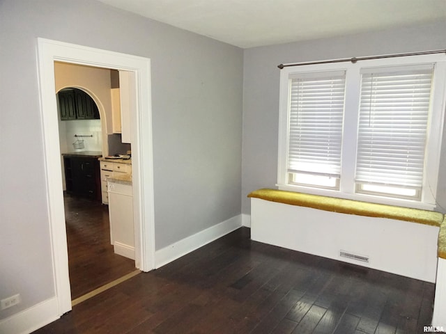 2536 S 10th St, Springfield, IL 62703 - empty room with dark wood-style floors and baseboards