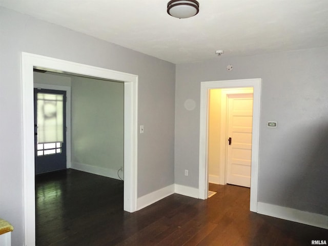 2536 S 10th St, Springfield, IL 62703 - unfurnished room featuring dark wood-style flooring and baseboards