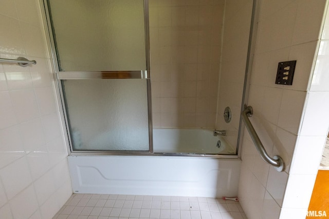 30 Ryder St, Nilwood, IL 62672 - bathroom with tile walls, enclosed tub / shower combo, and tile patterned floors