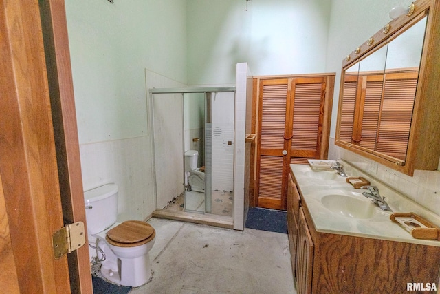 30 Ryder St, Nilwood, IL 62672 - full bathroom with toilet, double vanity, and a shower stall
