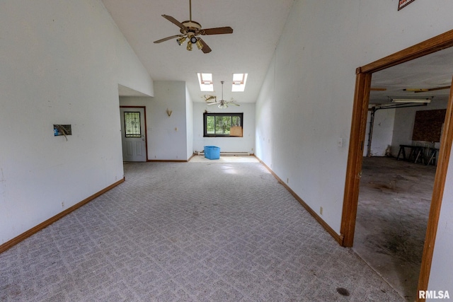30 Ryder St, Nilwood, IL 62672 - hall with a skylight, carpet floors, high vaulted ceiling, and baseboards