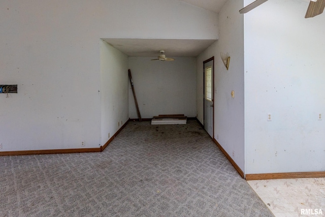 30 Ryder St, Nilwood, IL 62672 - carpeted spare room with a ceiling fan, lofted ceiling, and baseboards