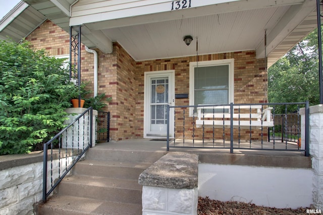 1321 Locust St, Quincy, IL 62301 - entrance to property with brick siding and a porch