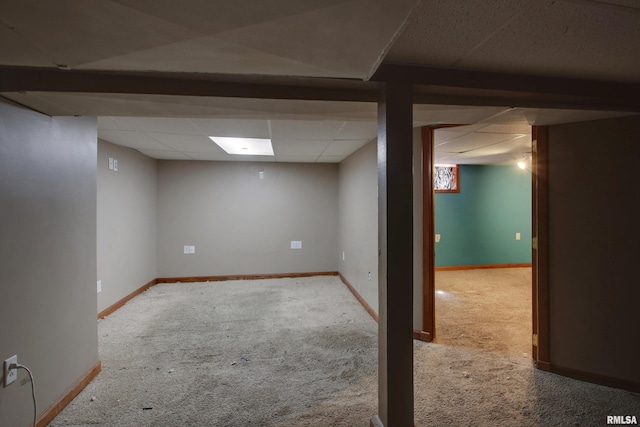 1321 Locust St, Quincy, IL 62301 - finished basement with carpet, a paneled ceiling, and baseboards