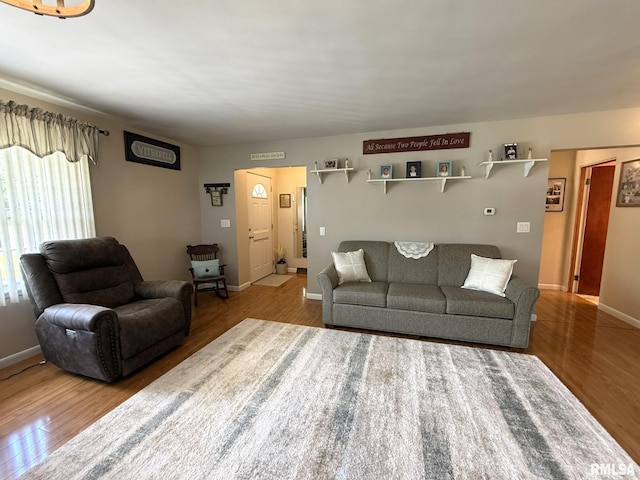 709 W Monmouth St, Abingdon, IL 61410 - living room with wood finished floors and baseboards