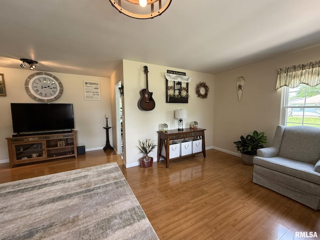 709 W Monmouth St, Abingdon, IL 61410 - living area with wood finished floors and baseboards