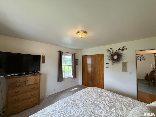 709 W Monmouth St, Abingdon, IL 61410 - carpeted bedroom featuring baseboards