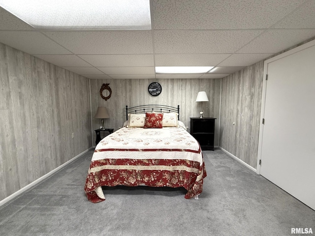 709 W Monmouth St, Abingdon, IL 61410 - carpeted bedroom featuring a drop ceiling and wood walls