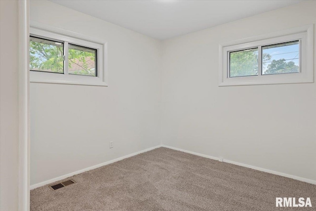 3225 Saxony Rd, Springfield, IL 62703 - carpeted empty room featuring healthy amount of natural light and baseboards