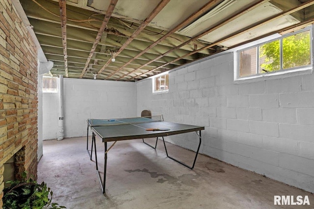 2557 S 6th St, Springfield, IL 62703 - game room with unfinished concrete floors and healthy amount of natural light