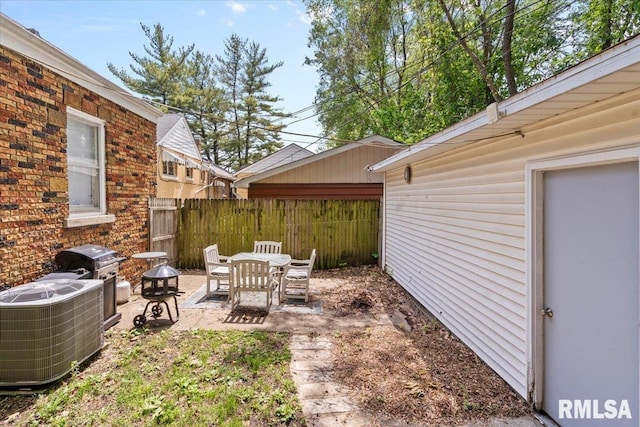 2557 S 6th St, Springfield, IL 62703 - view of yard with central AC and a patio area