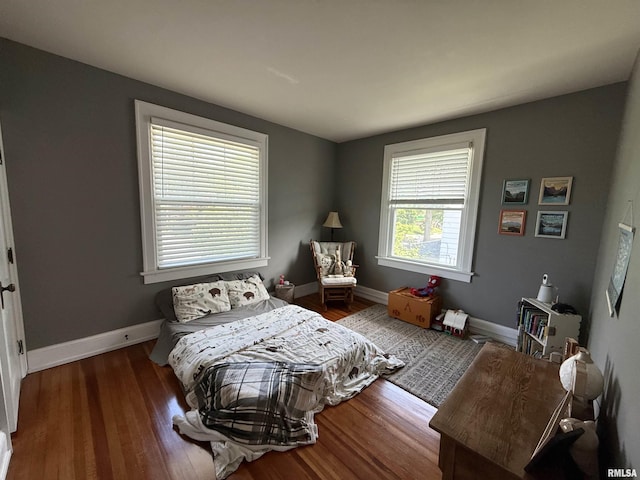 344 S 24th St, Quincy, IL 62301 - bedroom featuring wood finished floors and baseboards