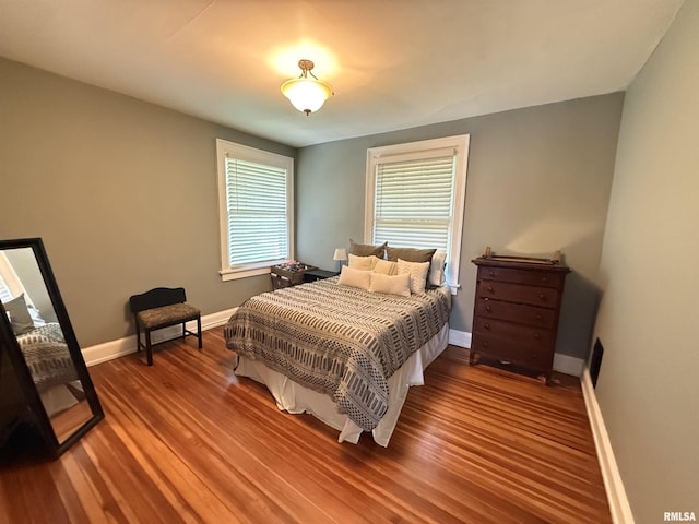 344 S 24th St, Quincy, IL 62301 - bedroom featuring baseboards and wood finished floors
