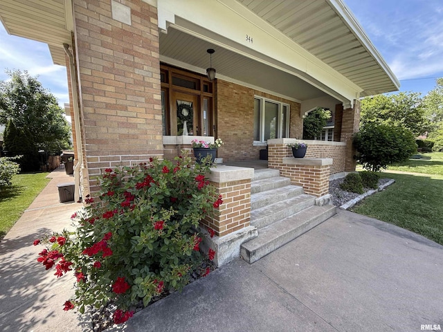 344 S 24th St, Quincy, IL 62301 - doorway to property with a porch and brick siding