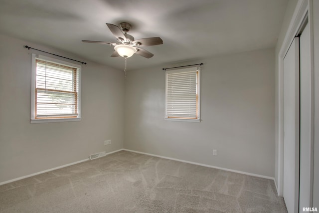 3705 Briarwood Dr, Quincy, IL 62301 - empty room with light colored carpet, a ceiling fan, and baseboards