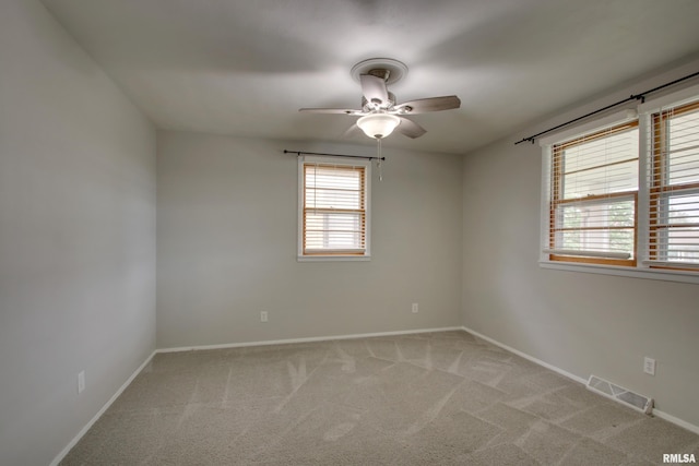 3705 Briarwood Dr, Quincy, IL 62301 - empty room with ceiling fan, light carpet, and baseboards