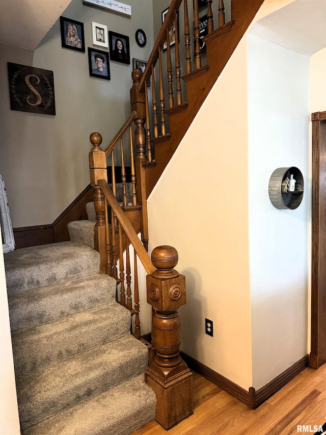 409 N Broadway St, Havana, IL 62644 - stairs featuring wood finished floors and baseboards