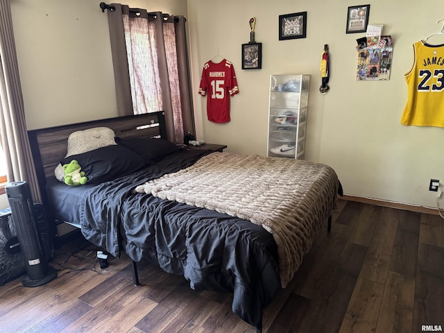 409 N Broadway St, Havana, IL 62644 - bedroom with hardwood / wood-style flooring