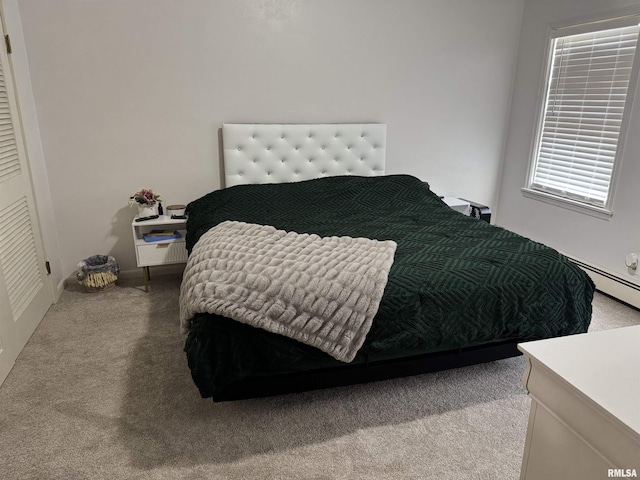 409 N Broadway St, Havana, IL 62644 - bedroom featuring carpet flooring and baseboard heating