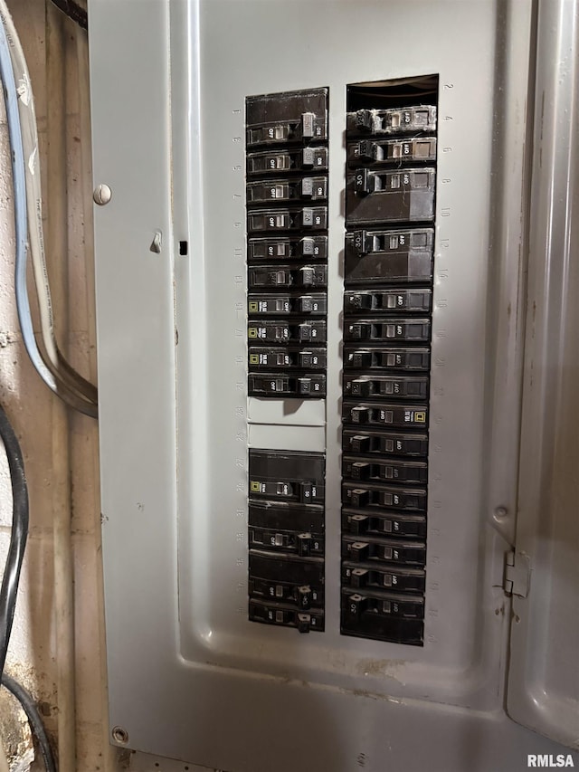 409 N Broadway St, Havana, IL 62644 - utility room featuring electric panel