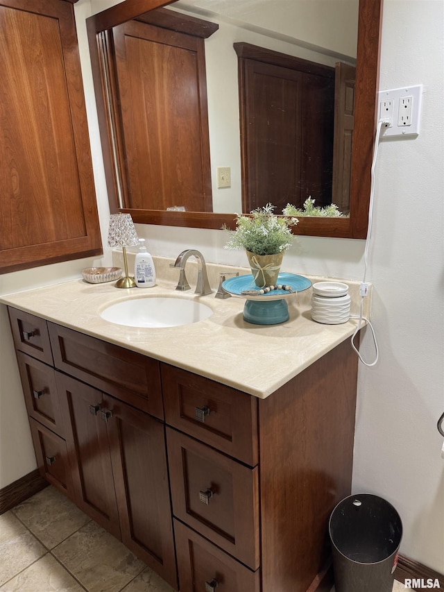 409 N Broadway St, Havana, IL 62644 - bathroom with vanity and tile patterned floors