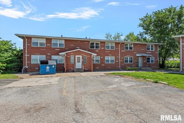 2309 W Lawrence Ave, Springfield, IL 62704 - view of property with entry steps, brick siding, and uncovered parking