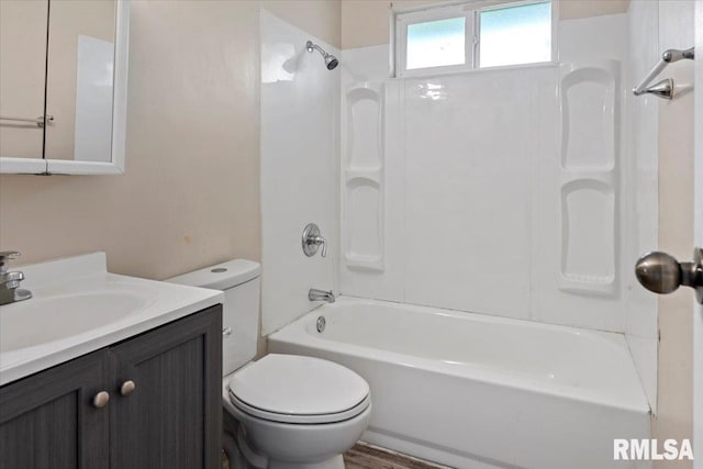 2309 W Lawrence Ave, Springfield, IL 62704 - bathroom with toilet, vanity, and tub / shower combination
