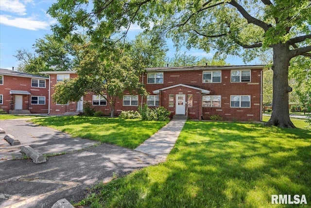2309 W Lawrence Ave, Springfield, IL 62704 - multi unit property with a front lawn, brick siding, and entry steps