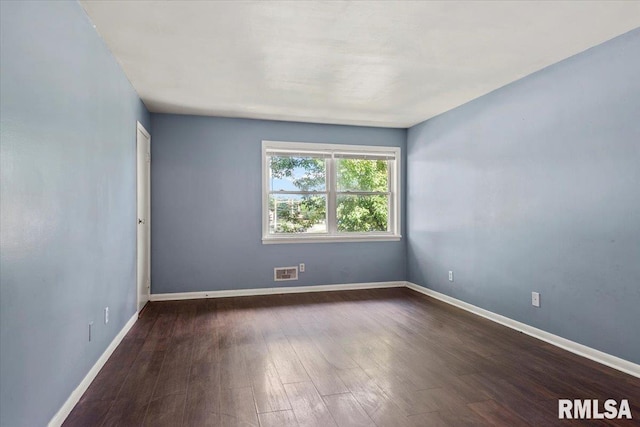 2309 W Lawrence Ave, Springfield, IL 62704 - spare room with wood finished floors and baseboards