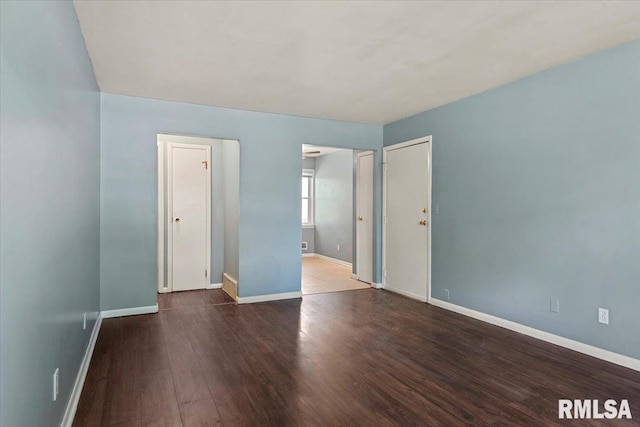 2309 W Lawrence Ave, Springfield, IL 62704 - spare room with wood finished floors and baseboards