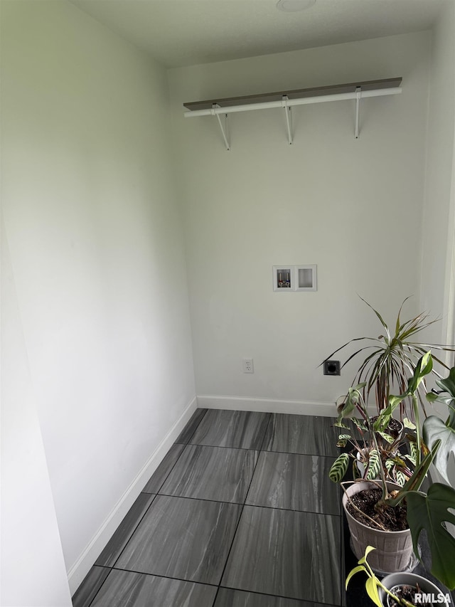 1352 N Lawrence Ave, Taylorville, IL 62568 - washroom with hookup for an electric dryer, washer hookup, and baseboards