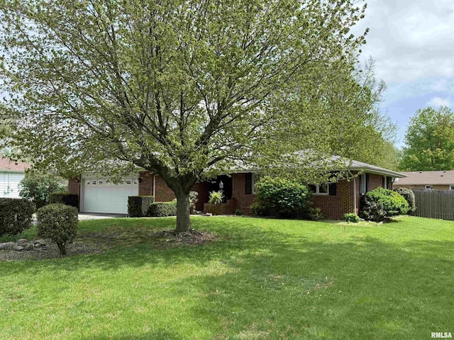1352 N Lawrence Ave, Taylorville, IL 62568 - view of front of property featuring brick siding and an attached garage