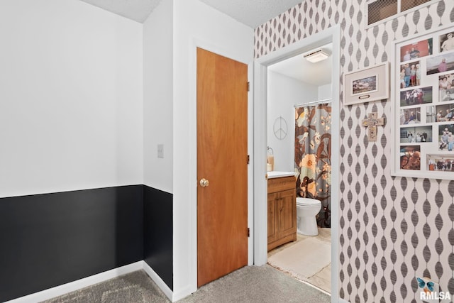 704 Rickard Rd, Springfield, IL 62704 - bathroom featuring vanity, toilet, a shower with curtain, and baseboards