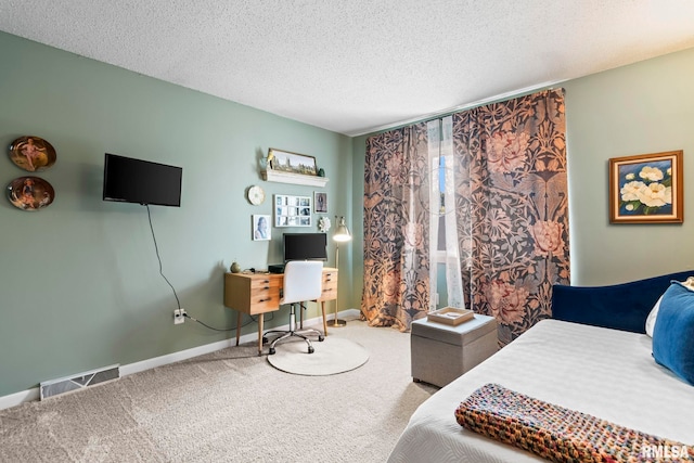 704 Rickard Rd, Springfield, IL 62704 - carpeted bedroom featuring a textured ceiling, baseboards, and an office area