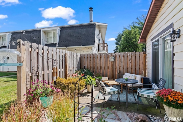 704 Rickard Rd, Springfield, IL 62704 - fenced backyard featuring a patio