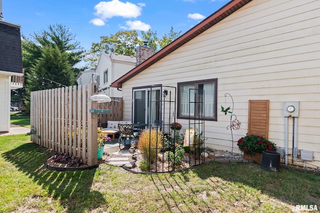 704 Rickard Rd, Springfield, IL 62704 - back of property with a chimney and a patio area