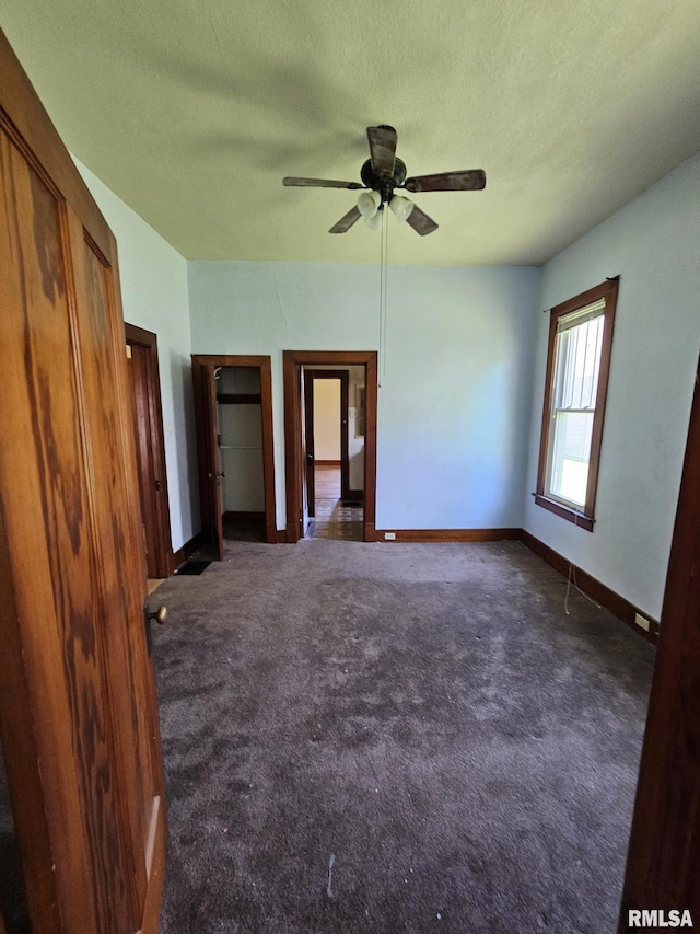 216 W Church St, Palmyra, MO 63461 - spare room with carpet flooring, ceiling fan, and a textured ceiling