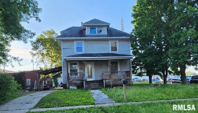 310 N Dean St, Bushnell, IL 61422 - traditional style home with a porch