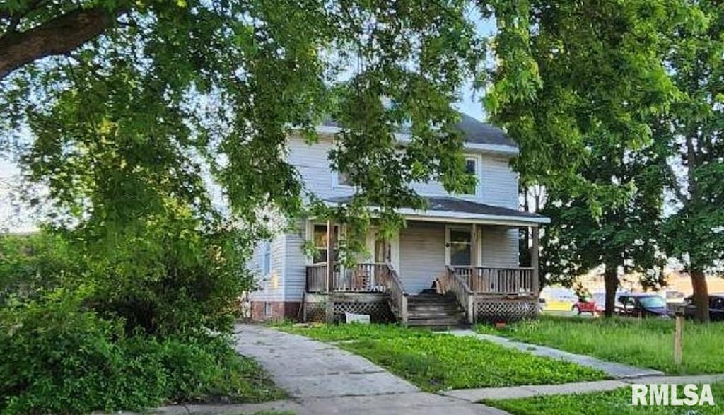 310 N Dean St, Bushnell, IL 61422 - view of front of house featuring covered porch