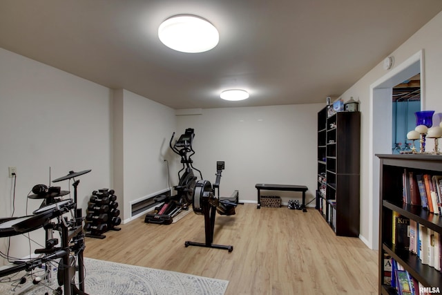 130 S State St, Mendon, IL 62351 - exercise room with wood finished floors and baseboards