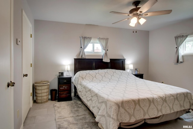 130 S State St, Mendon, IL 62351 - bedroom with light tile patterned flooring and ceiling fan