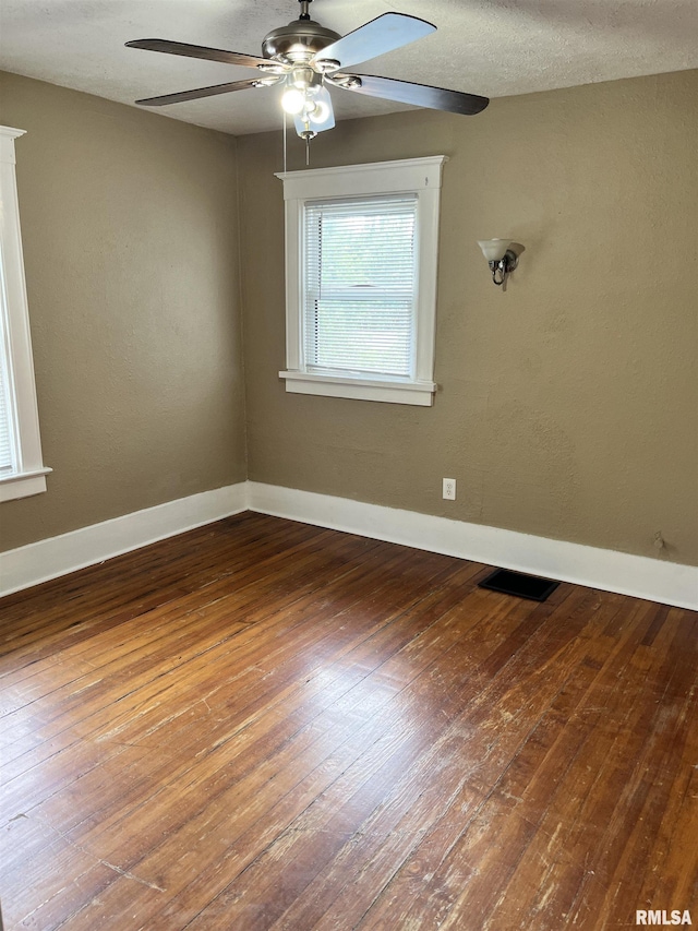 626 W Edwards St, Springfield, IL 62704 - empty room featuring ceiling fan, hardwood / wood-style floors, and baseboards