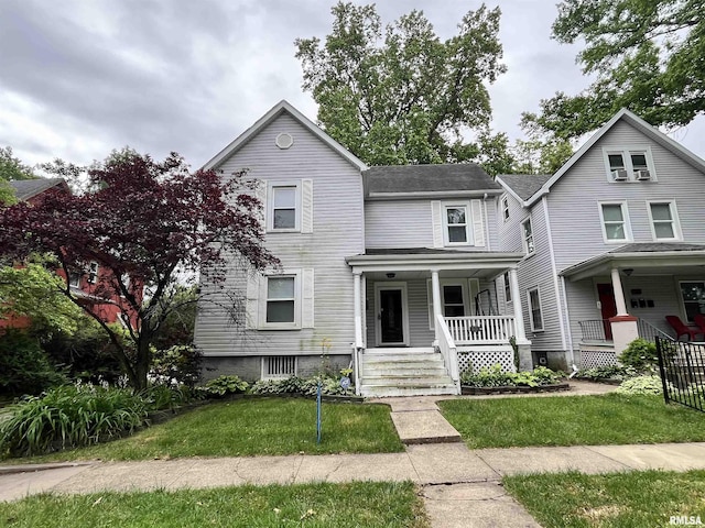 626 W Edwards St, Springfield, IL 62704 - view of front facade with a porch and a front yard